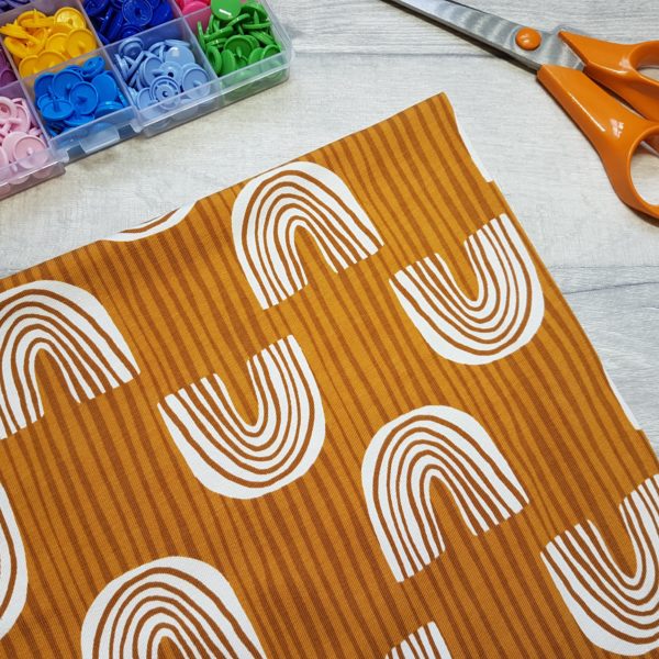Sketched Rainbow Ochre Jersey Knit Fabric