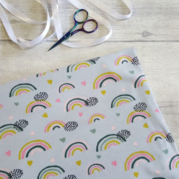 Rainbows on Grey Organic Cotton Elastane Jersey Knit Fabric