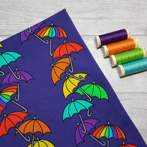Tumbling Umbrellas Jersey Fabric