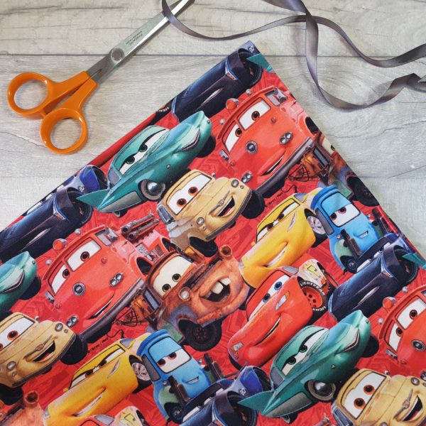 Cars on Red Licensed Cotton Elastane Jersey Knit Fabric